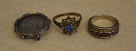 2 silver rings and a Victorian coin in a silver mount