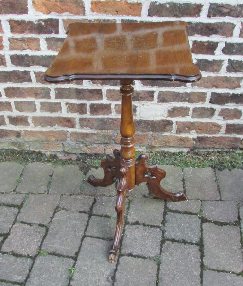 Victorian carved top tripod table