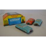 Approx 1930/50s tinplate small garage and 3 cars