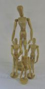 4 assorted sized wooden artist's mannequins (largest approx 72 cm)