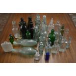 Various glass bottles including torpedo, codd,