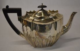 Silver teapot with engraving 'Presented to Mr J L Romles by his Cleethorpes friends,