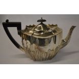 Silver teapot with engraving 'Presented to Mr J L Romles by his Cleethorpes friends,