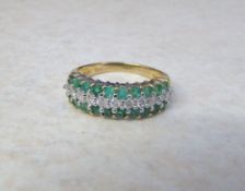 9ct gold emerald and diamond ring (diamonds total 0.