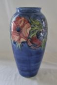 Large blue Anemone pattern Moorcroft vase with green Walter Moorcroft signature to underside H 32