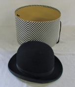 Black bowler hat by G R Dunn & Co Ltd, Piccadilly Circus, Strand,