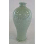 Chinese celedon baluster shaped vase with Qianlong seal mark to base,