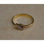 18ct gold illusion set diamond twist ring, approx total weight 2.