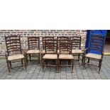 8 (inc 2 carvers) rush seated ladder back chairs