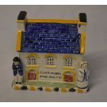 Staffordshire style money box in the shape of a house 'Alice Barnes, Born June 7th,