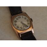 9ct gold body wristwatch on leather strap,