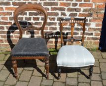 Victorian ebonised nursing chair and a balloon back chair