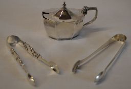 Silver mustard pot and two pairs of silver sugar tongs