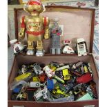 Suitcase containing play worn robots and die cast cars inc Dinky and Corgi