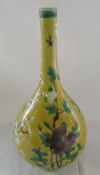 Chinese yellow and green ground bulbous vase with prunus decoration H 34 cm