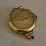A 14ct gold 'Brevet DRGM' wristwatch with dial marked 'Dominador'