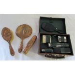Art Nouveau copper mirror and brush set & a Gentleman's travel set in miniature leather suitcase
