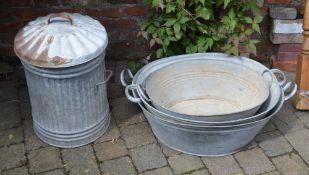 3 galvanized troughs and a galvanized bin
