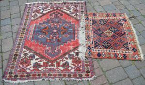 Small Persian rug and a prayer mat