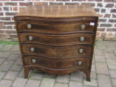 Serpentine fronted reproduction Georgian chest of drawers with brushing slide & ring handles on