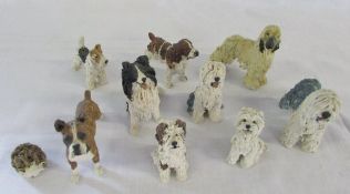 Various pottery dogs marked SW