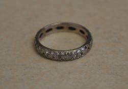 18ct white gold diamond chip eternity ring (some small stones missing) Ring Size N