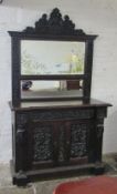 Large ornately carved 19th century oak sideboard with mirror back L 130 cm H 225 cm approx