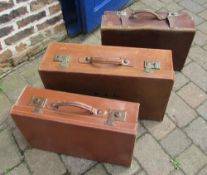3 vintage leather suitcases