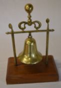 Winkworth brass hanging bell on stand