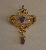 Possibly 18ct gold (no hallmarks) amethyst and pearl brooch (some pearls missing,