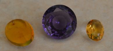 A topaz and citrine loose gemstones,