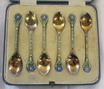 Cased silver and enamel teaspoons Birmingham 1930 total weight 1.