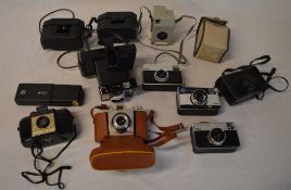 Vintage cameras including Polaroid Colorpack 80, Kodak Instamatics,