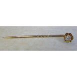 Tested as 9ct gold diamond stick pin total weight 1.5 g diamond approx 0.