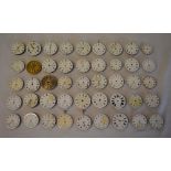 45 pocket watch movements and dials for spares or repairs, including makers Montine of Switzerland,