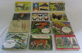 Various cigarette cards with albums