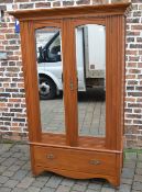 Late Victorian mirror fronted wardrobe
