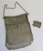 White metal chain handbag with a small purse marked 'silver'