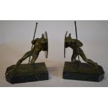 Bronze and marble book ends of warriors charging with shields