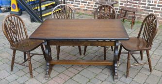 Small refectory table and 4 wheel back chairs