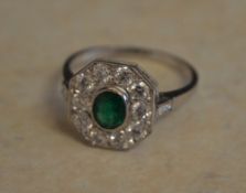 18ct white gold emerald and diamond octagonal cluster ring,