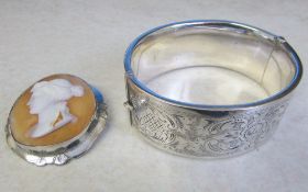 Silver bangle weight 1.58 ozt & silver cameo brooch 0.