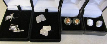 4 pairs of silver cufflink's