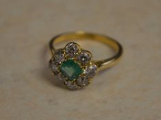 18ct gold central square cut emerald and diamond cluster ring,