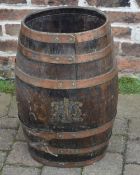 Old barrel with royal coat of arms & copper bands