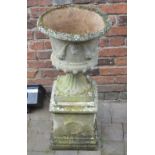 Stone effect classical urn on pedestal