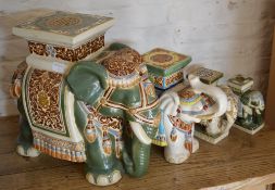 Four elephant plant stands