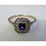 9ct gold ring with central square cut sapphire surrounded by white quartz size M (total weight 1.