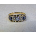Tested as 18ct gold diamond and sapphire ring size K/L (total weight 3.