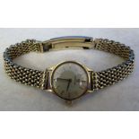 Ladies 9ct gold Omega wristwatch with 9ct gold strap total weight 30.